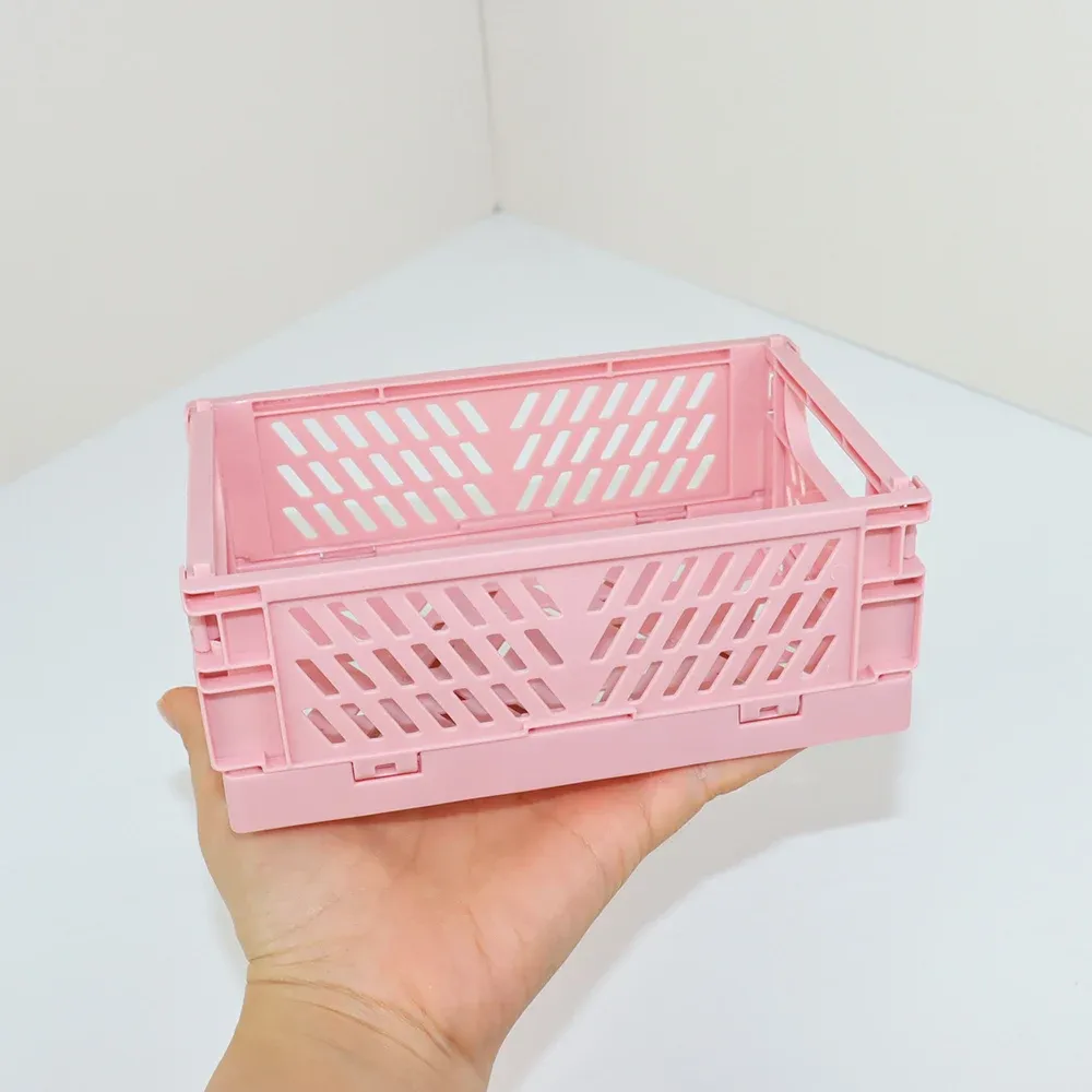 Boîte de rangement pliable en usage
