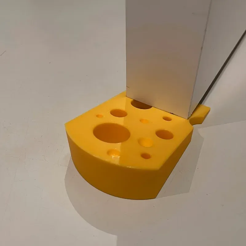 Butée de porte en forme de fromage, détail du design