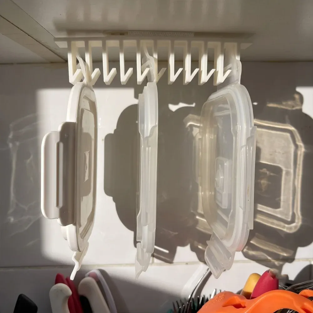 Organisateur de couvercles à clipser, idéal pour les couvercles de contenants alimentaires. Support et crochet pour ranger les couvercles en plastique. 4