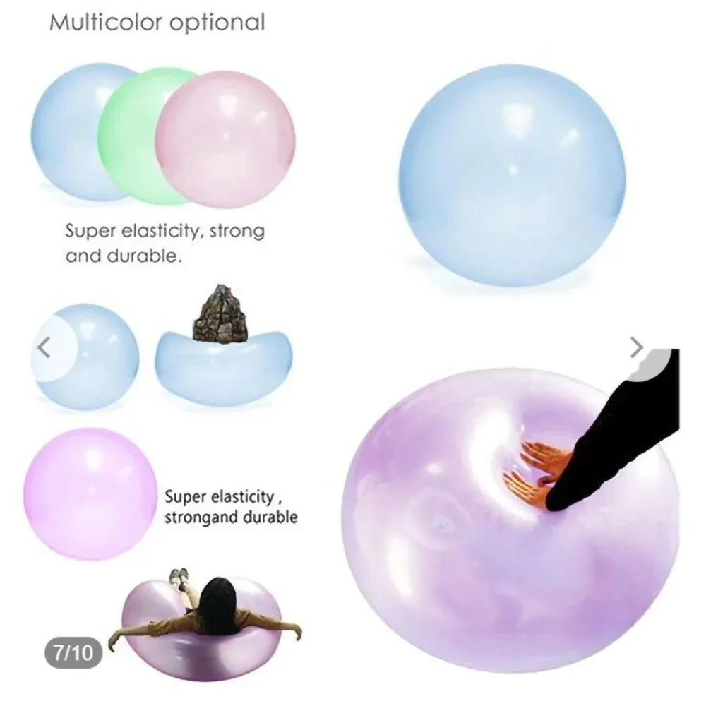 Enfants jouant avec un ballon gonflable dans le jardin