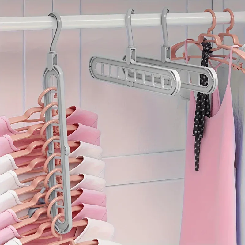 Cintres pliables en plastique pliés pour le rangement