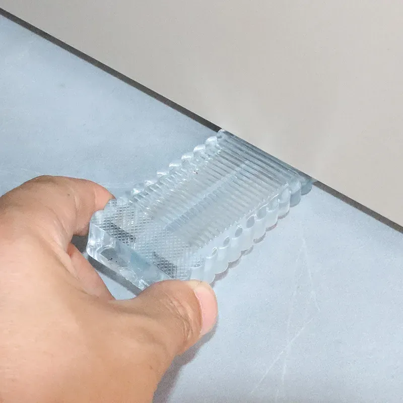 Lot de quatre butées de porte transparentes