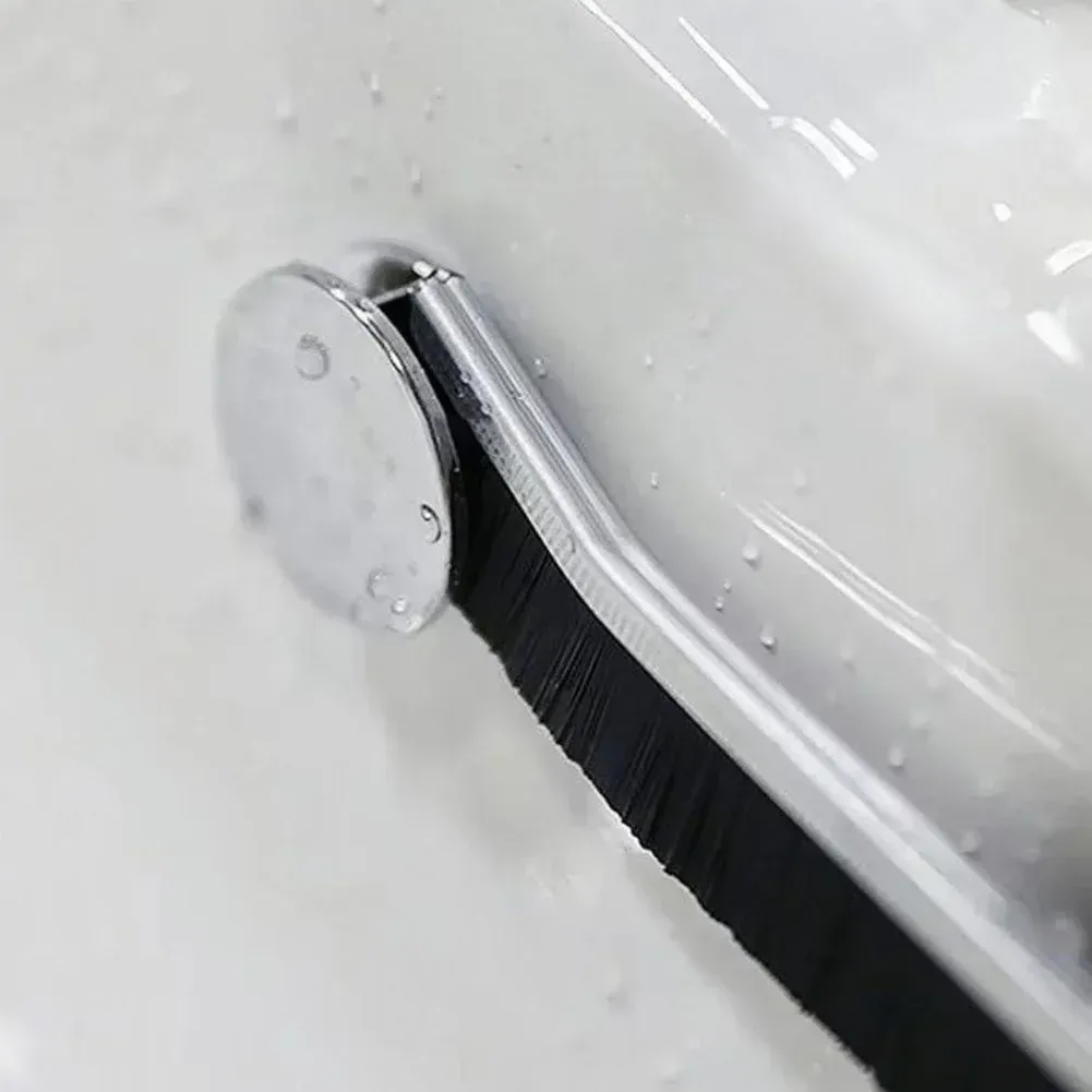 Brosse de nettoyage, détail du manche ergonomique