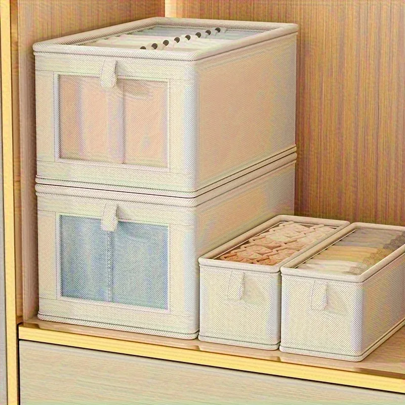Boîte de rangement en toile pliable dans un placard