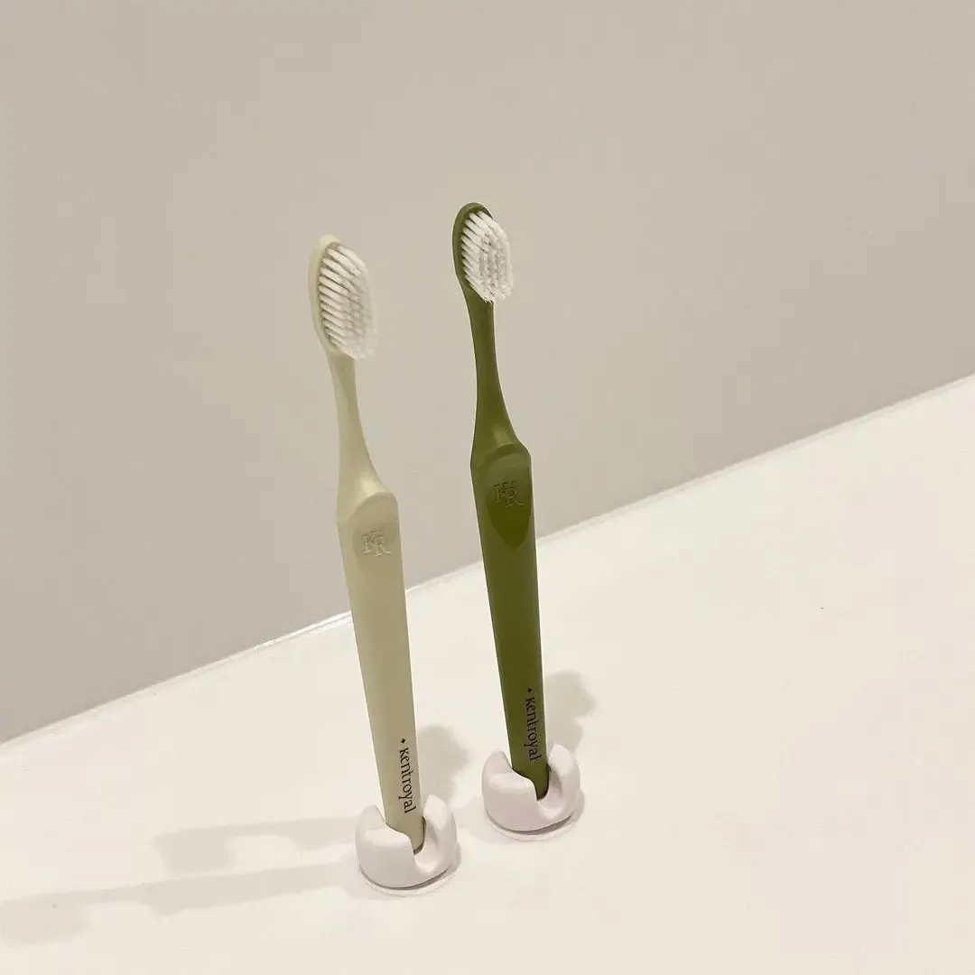 Support de brosse à dents à ventouse dans un intérieur de salle de bain