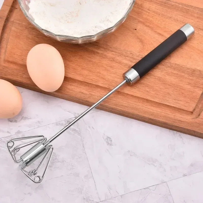 Batteur à œufs manuel en acier inoxydable avec poignée en caoutchouc - Image 1