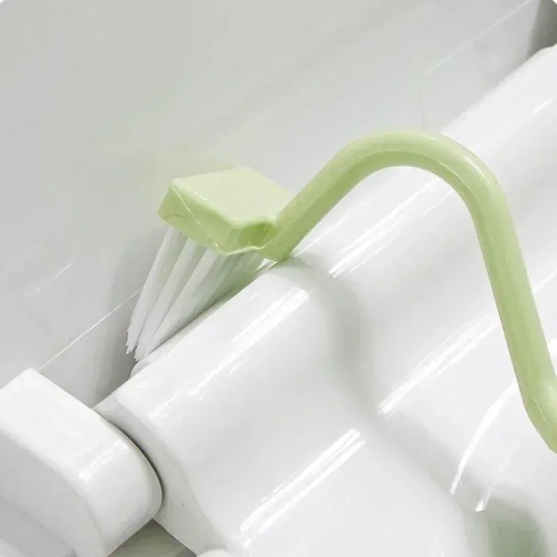 Détail de la tête de brosse incurvée