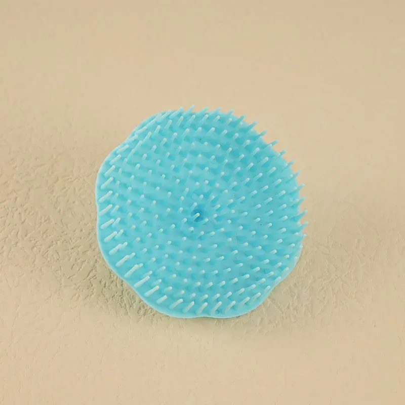 Brosse à shampoing en mode massage