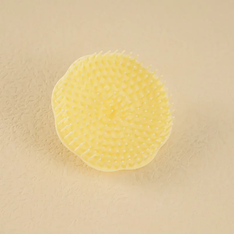 Brosse à shampoing, utilisation sous la douche