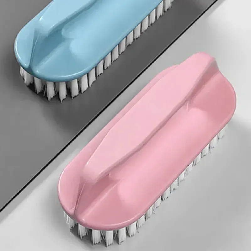 Brosse à récurer dans le linge et les textiles