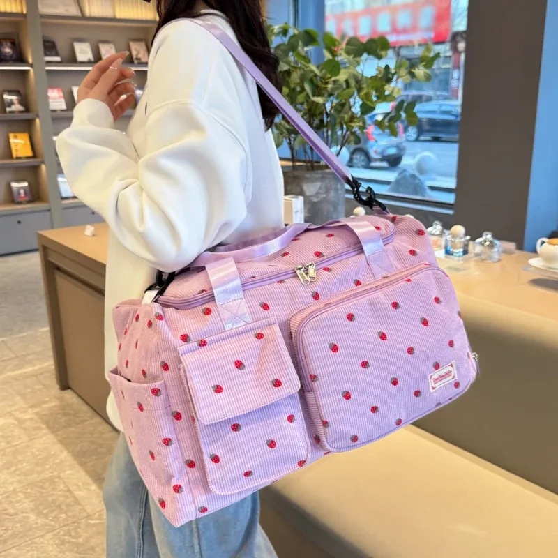 Sac en velours côtelé, détail des poignées