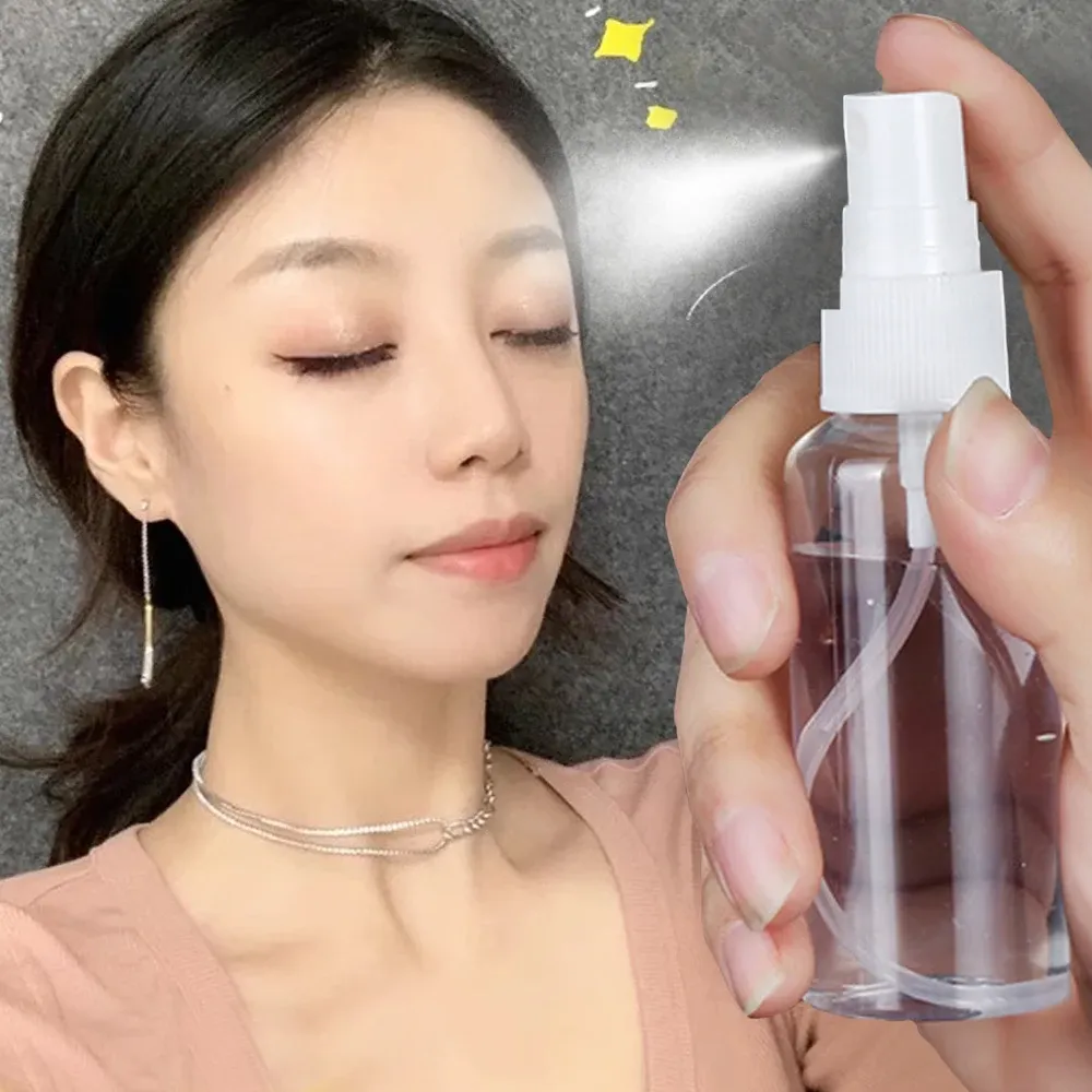 Flacon pulvérisateur transparent portable, vue d'ensemble