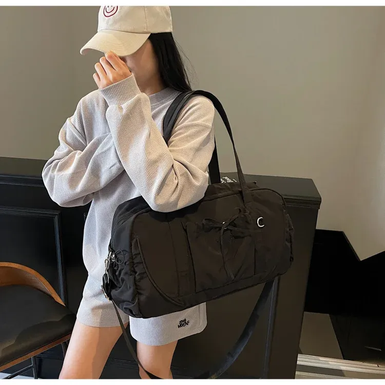 Sac de voyage, détail de la poignée