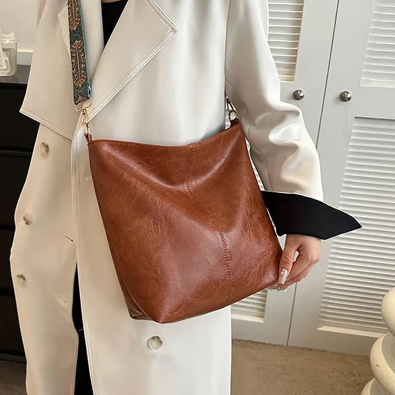 Sac seau à bandoulière, détail de la sangle