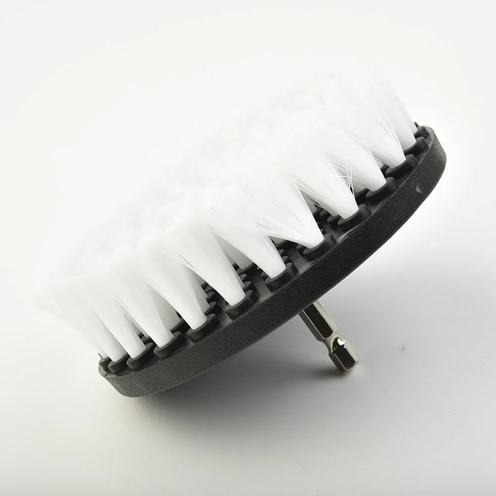 Brosse de nettoyage utilisée sur du verre