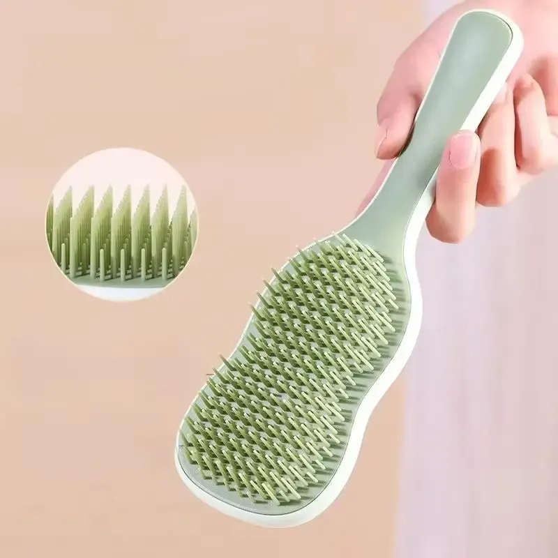 Peigne démêlant anti-emmêlage à effet massant – Brosse à cheveux bouclés à séchage rapide, outil de coiffure pour des cheveux sains - Image 1