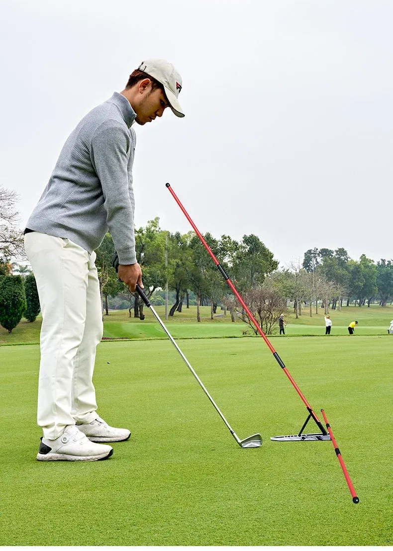 Posture d'adresse corrigée avec l'entraîneur de golf