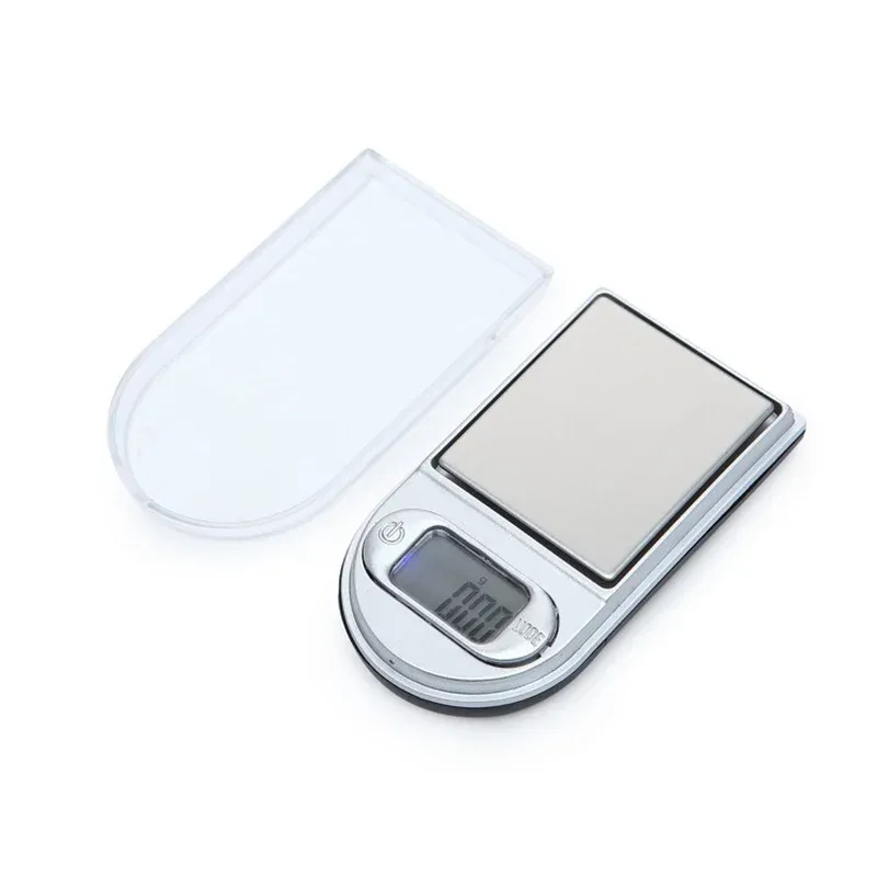 Balance de poche accompagnée de ses accessoires