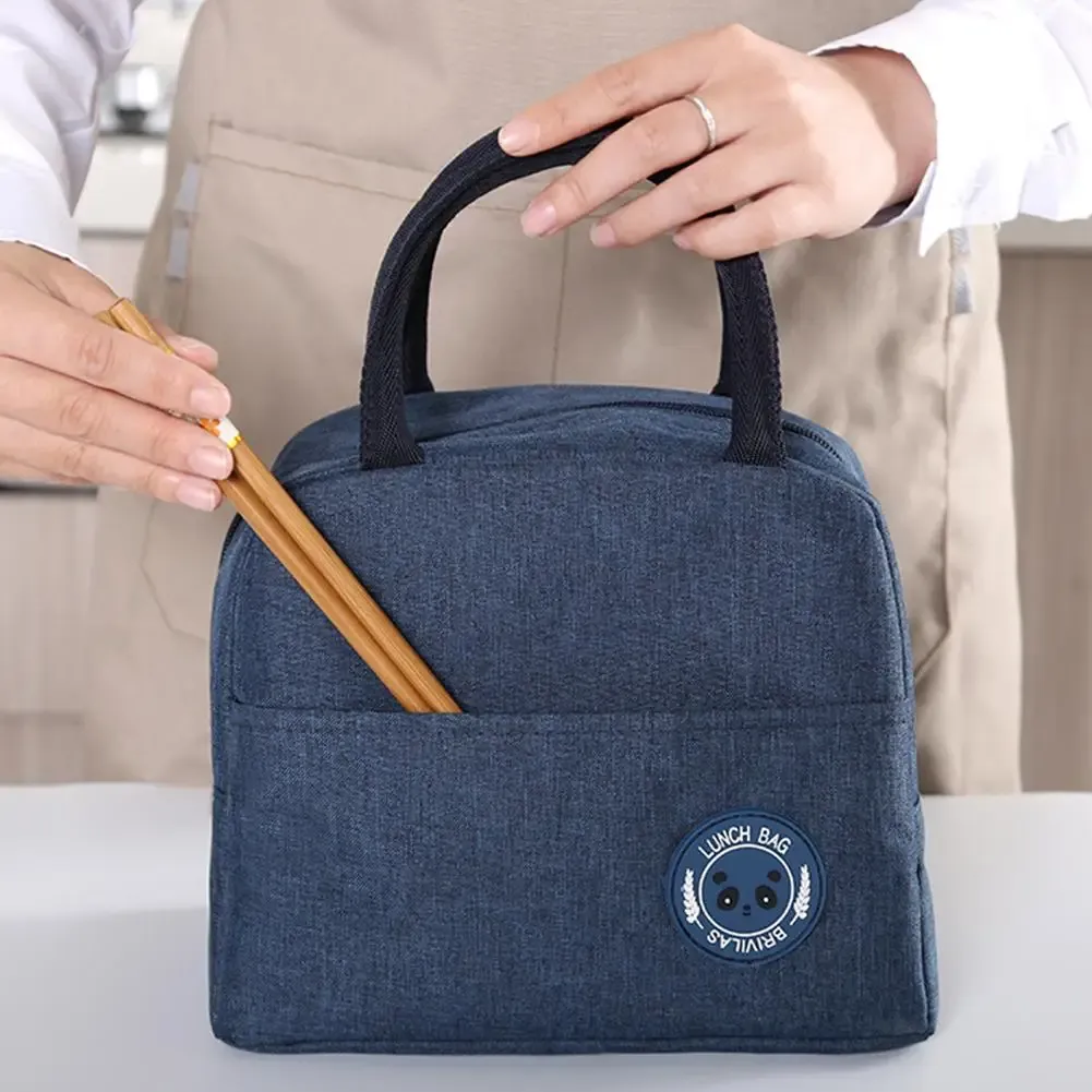 Sac repas isotherme porté à la main