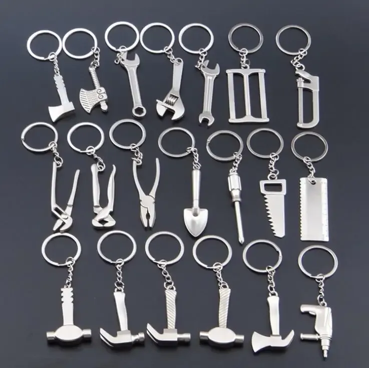 Porte-clés multifonction pour homme, outil d'extérieur compact avec règle, clé à marteau et pince pelle - Image 1