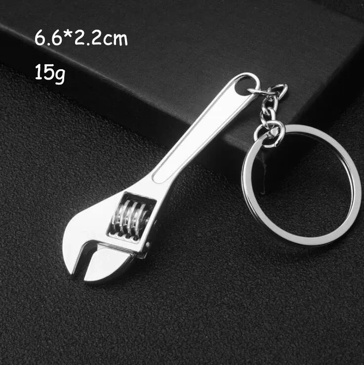 Porte-clés multifonction pour homme, outil d'extérieur compact avec règle, clé à marteau et pince pelle 25