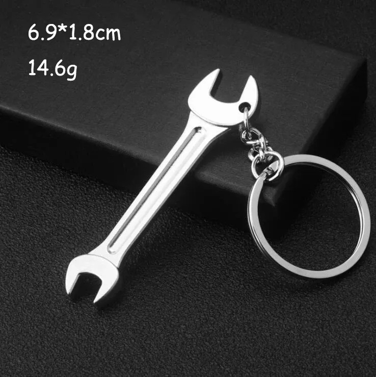 Porte-clés multifonction pour homme, outil d'extérieur compact avec règle, clé à marteau et pince pelle 27