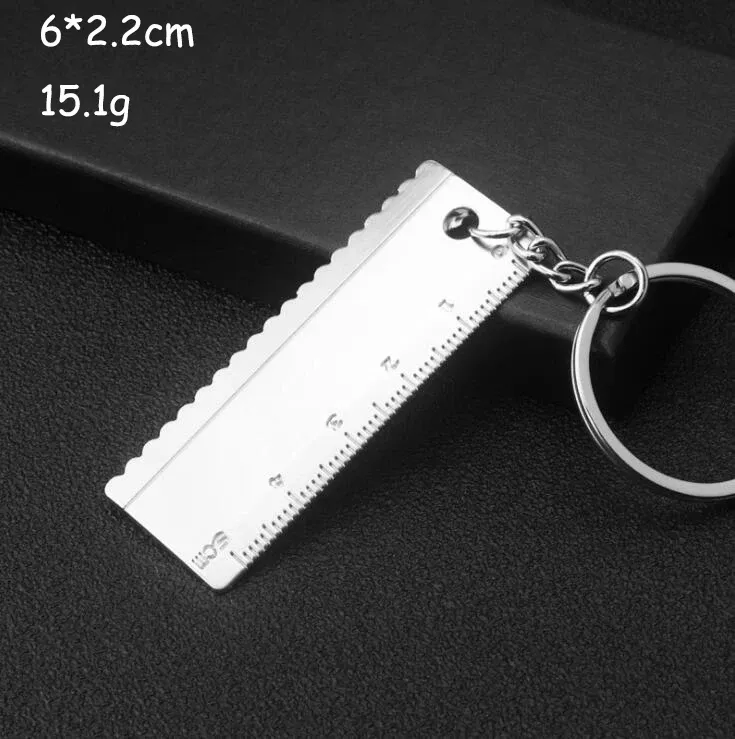 Porte-clés multifonction pour homme, outil d'extérieur compact avec règle, clé à marteau et pince pelle 7