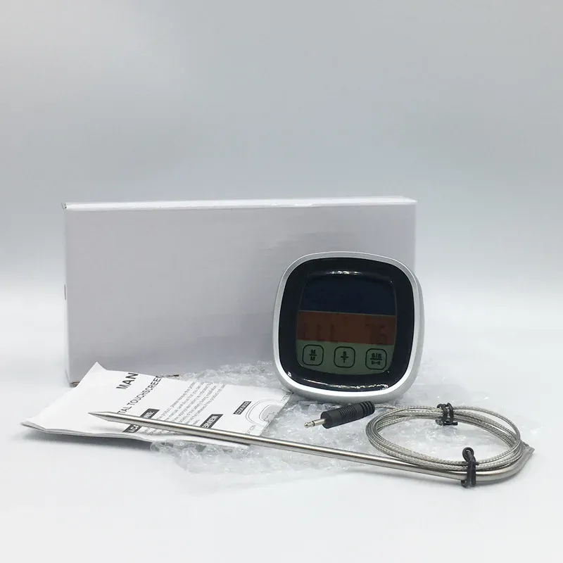 Thermomètre fixé sur une surface métallique grâce à ses aimants