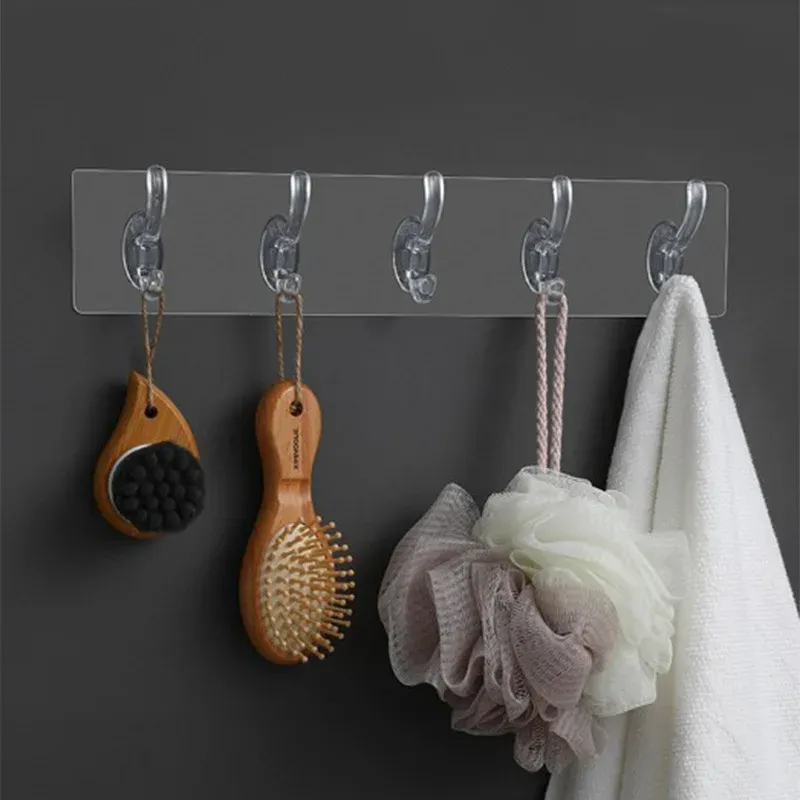 Crochet mural transparent sur porte en verre