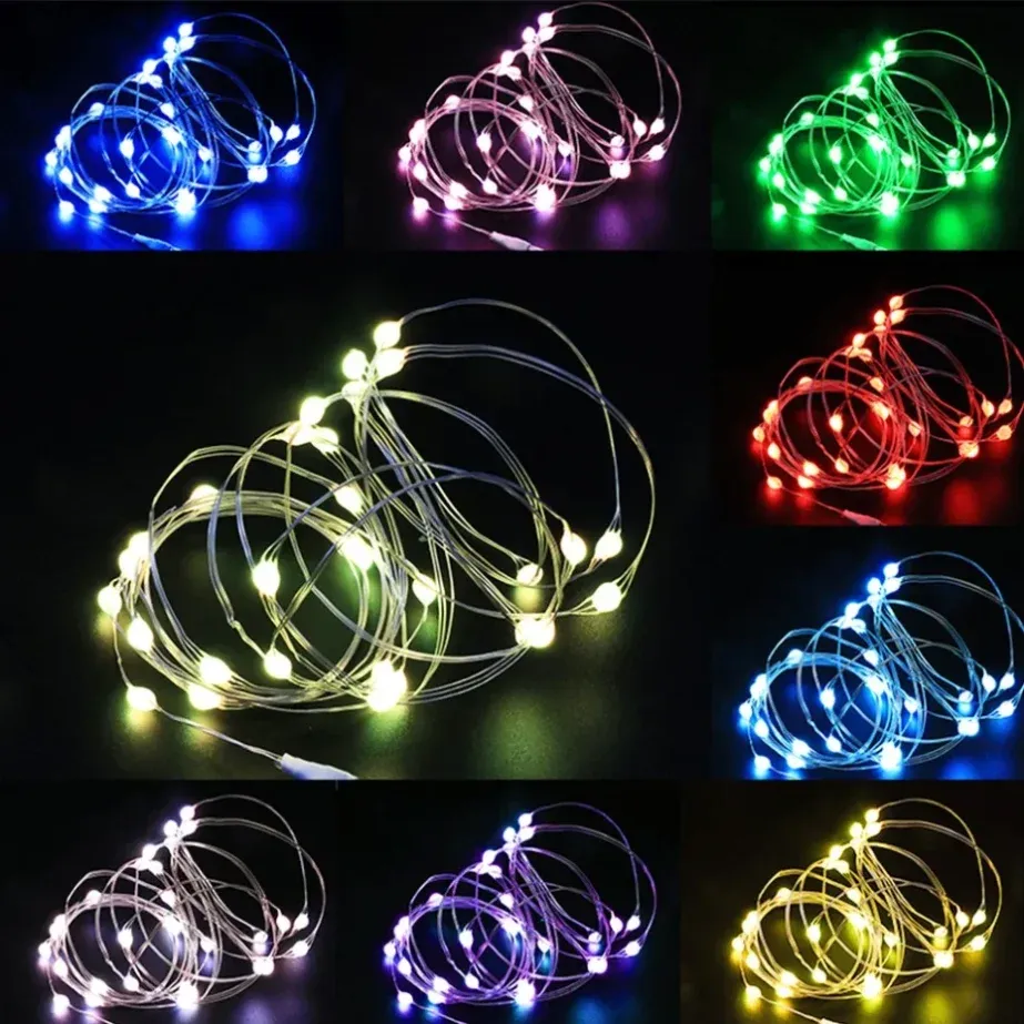 Guirlande lumineuse féerique en fil de cuivre allumée dans un intérieur chaleureux