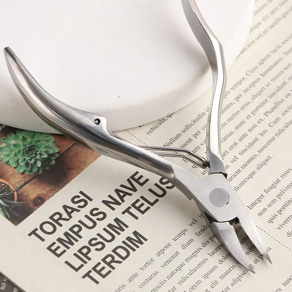 Coupe-ongles en acier inoxydable, ambiance