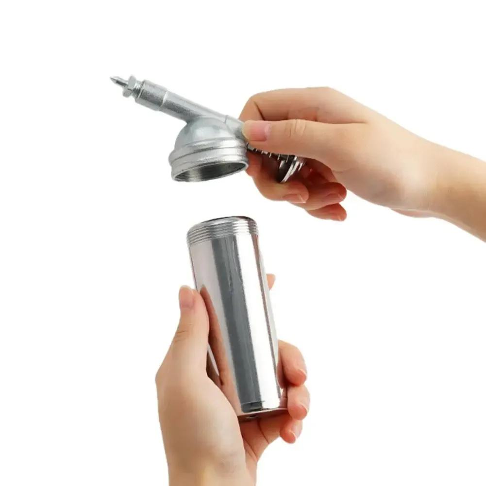 Pistolet à graisse, détail du mécanisme