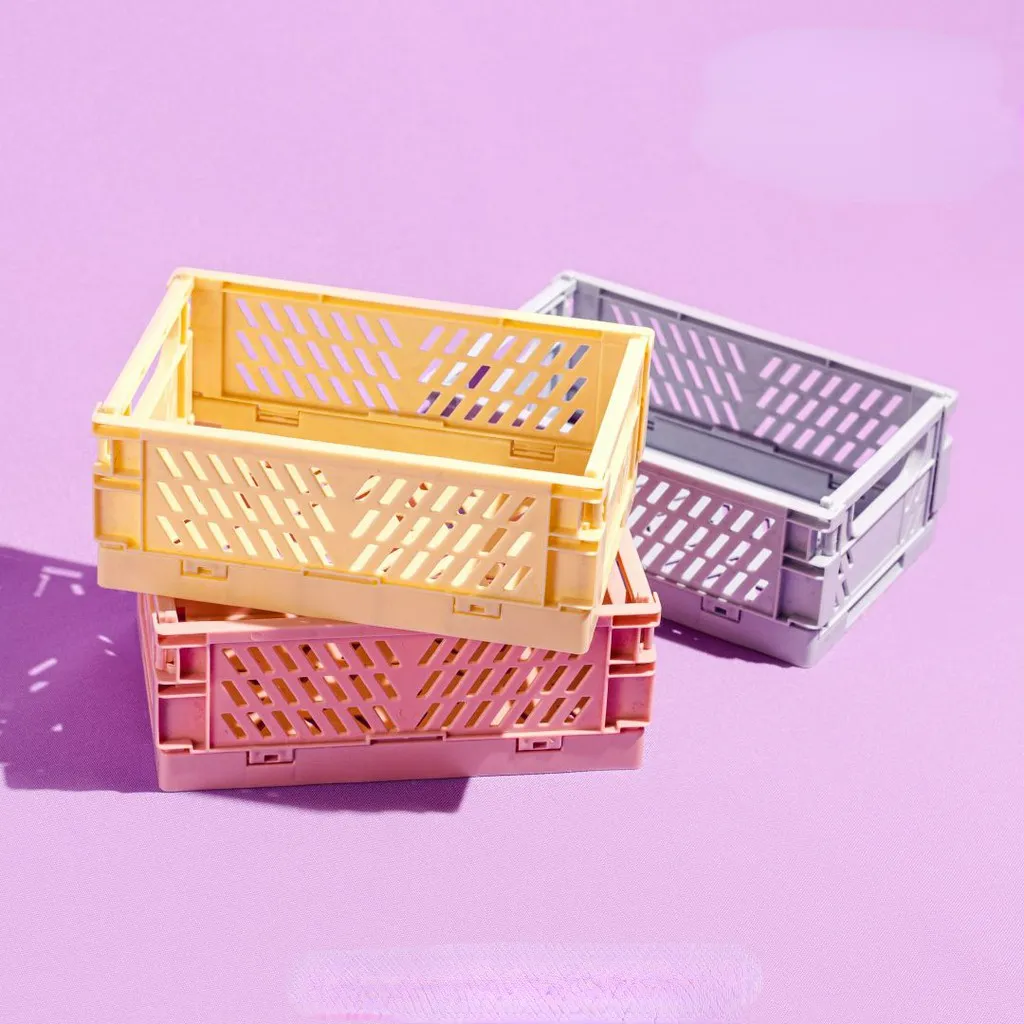 Caisse de rangement pliable en plastique, en situation