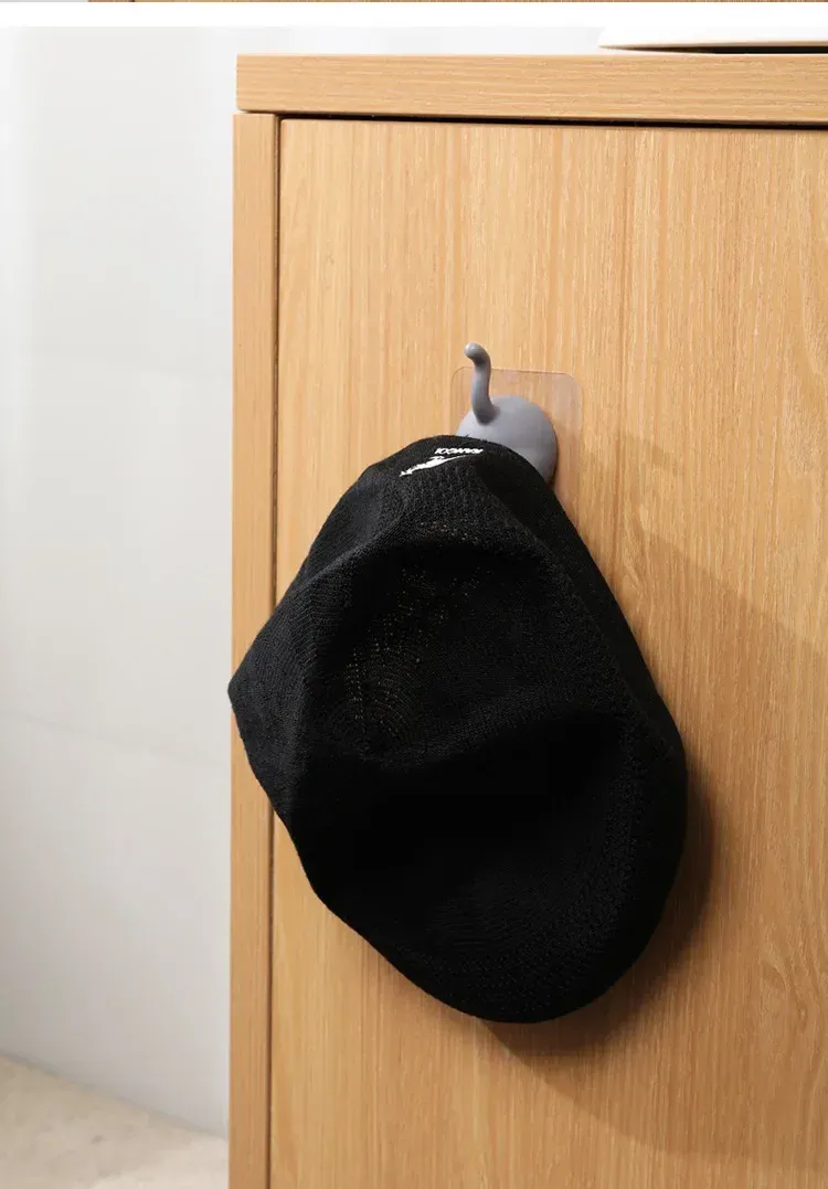 Porte-brosse à dents queue d'animal installé au mur