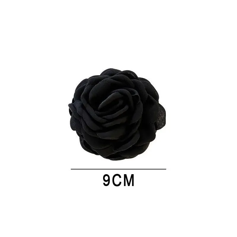 Pinces à cheveux fleur rose sur fond clair