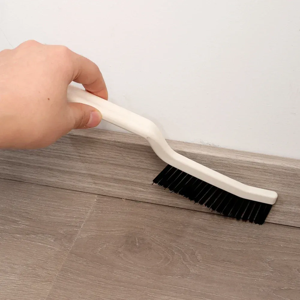 Brosse pour rainures de rail