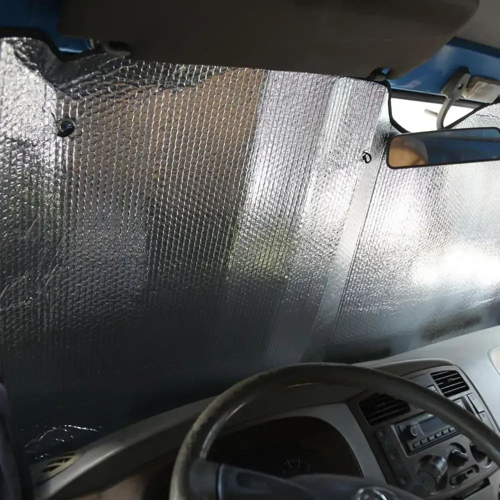 Pare-soleil pour pare-brise de camion, système à ventouse