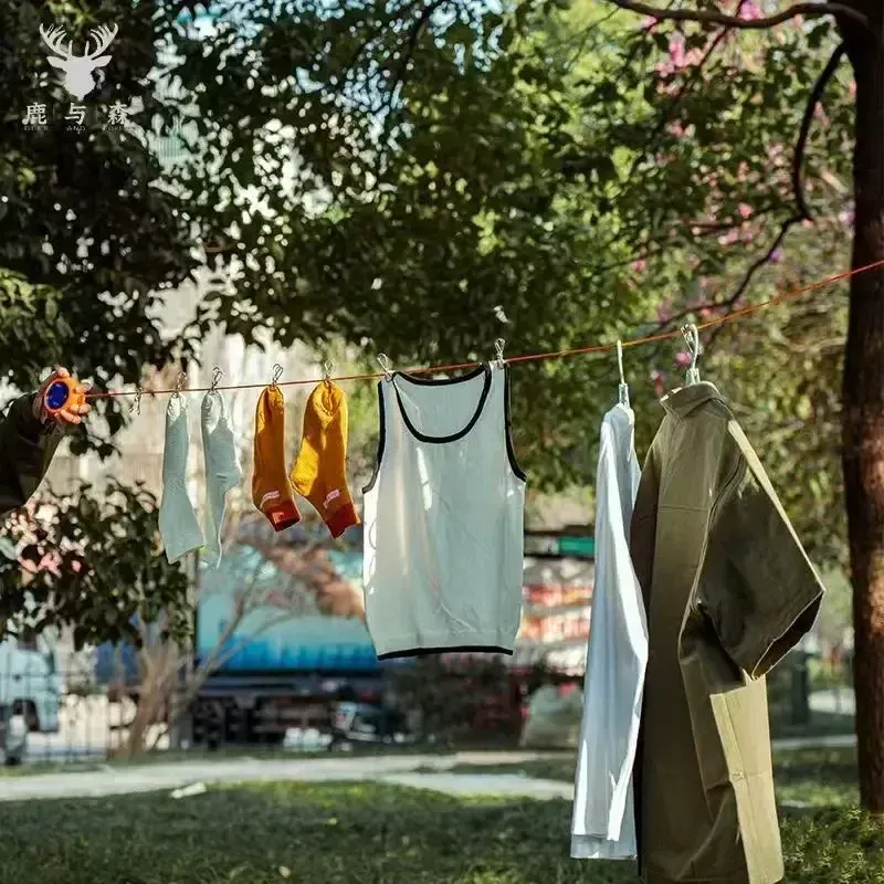 Corde à linge rétractable, en intérieur