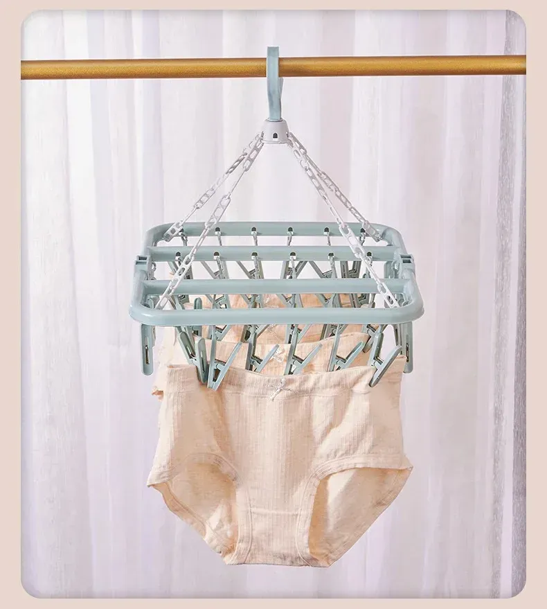 Cintre anti-goutte pliable, finition et détails