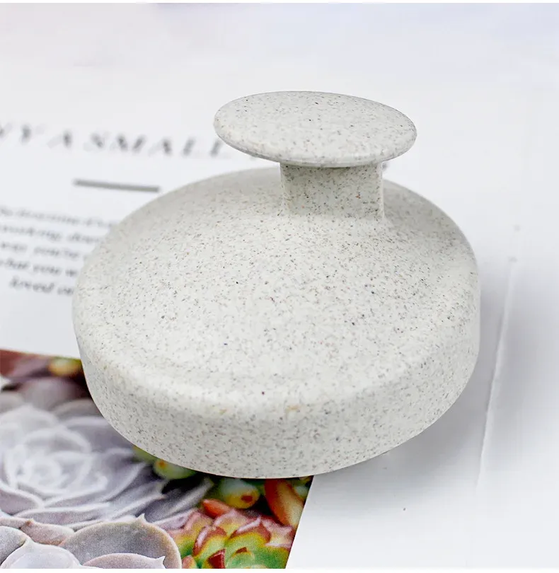 Brosse de massage pour cuir chevelu, prise en main