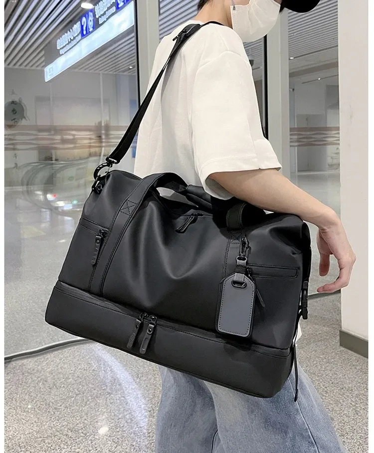 Détail du sac de voyage homme