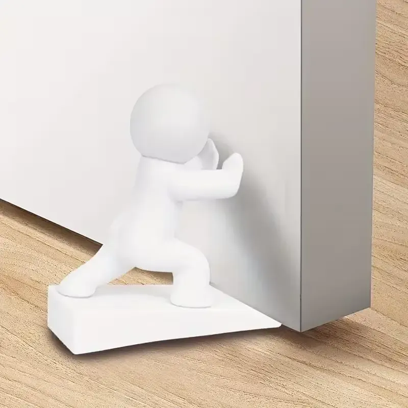 Butée de porte humanoïde blanche, détail de la base