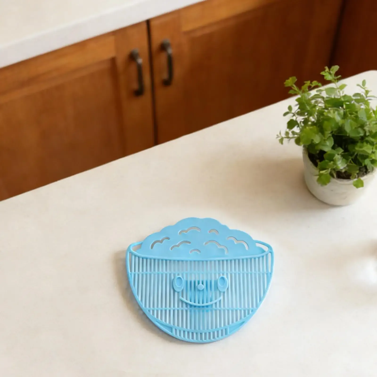 Passoire à clipser utilisée pour égoutter les pâtes