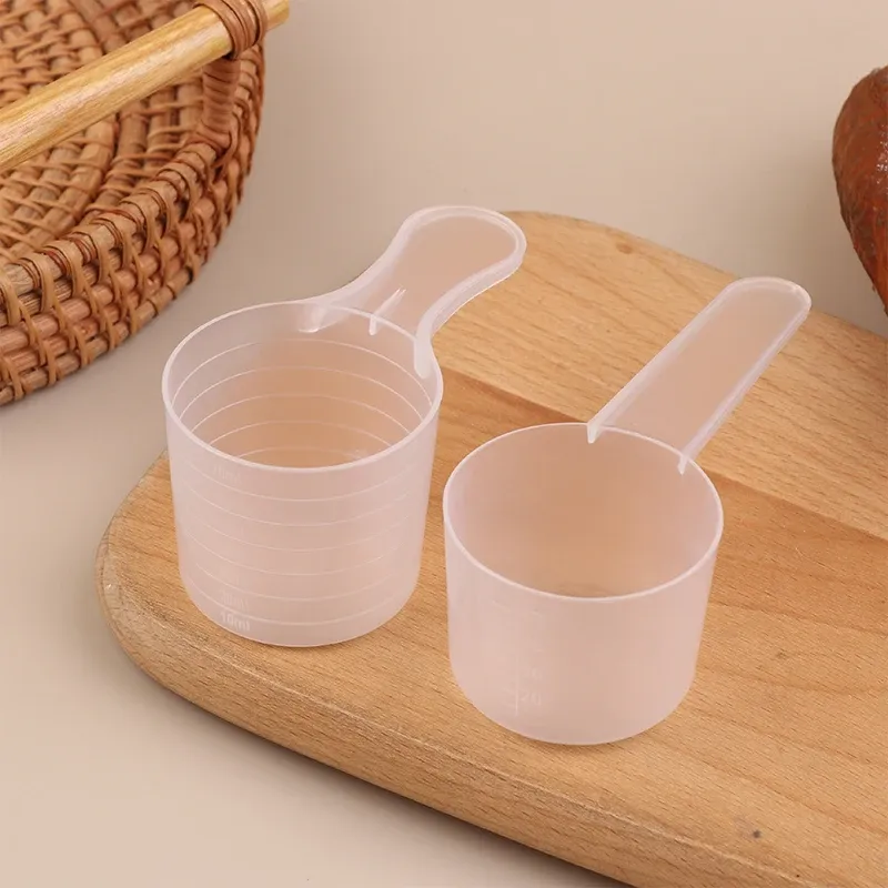 Cuillères doseuses en situation d'utilisation