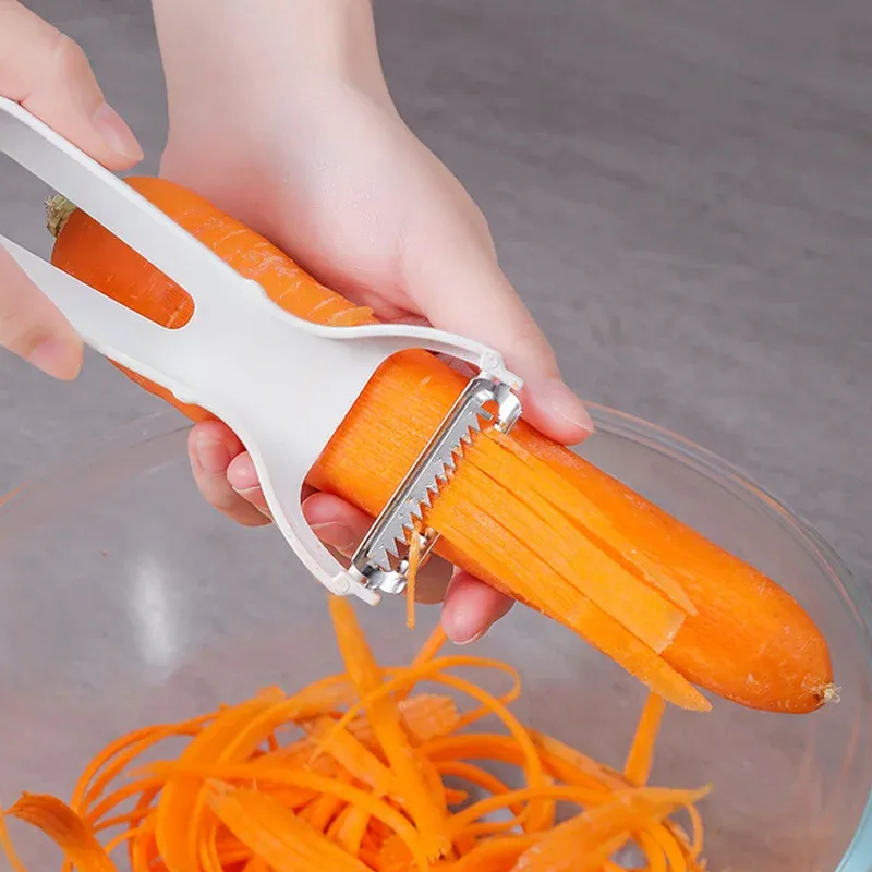 Râpe à légumes manuelle multifonction, hachoir à fruits et légumes, coupe-julienne, éplucheur et trancheur de cuisine 2