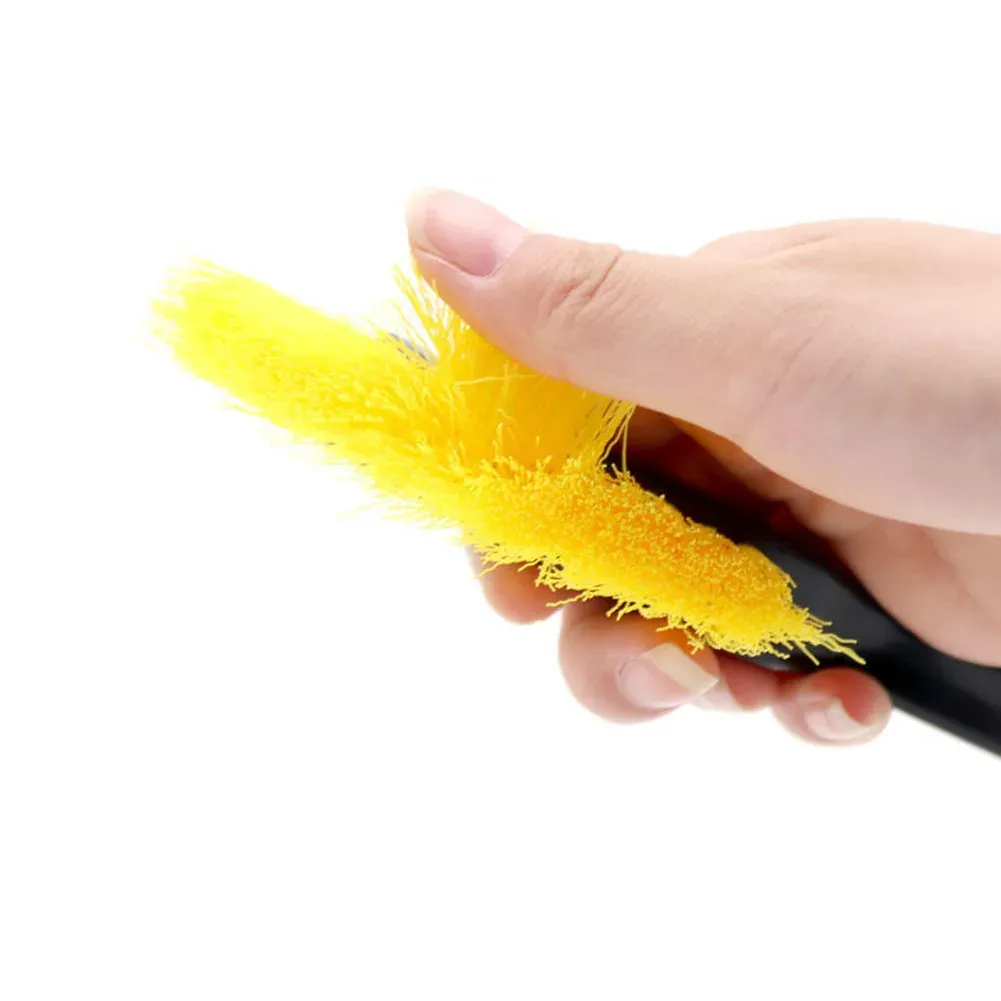 Brosse de jante à tête incurvée, détail de la tête