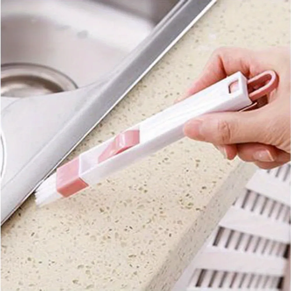 Pelle à poussière intégrée à la brosse