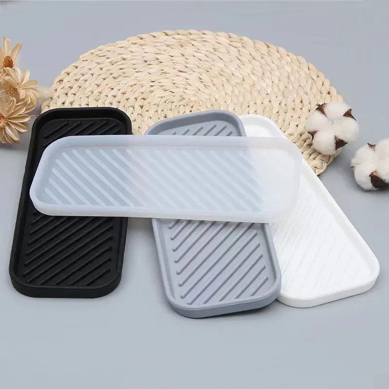 Le titre est déjà en français. Une version plus propre et professionnelle serait :
Porte-éponge en silicone, tapis de séchage polyvalent antidérapant, résistant à la chaleur, tapis d'égouttage pour cuisine et salle de bain - Image 1