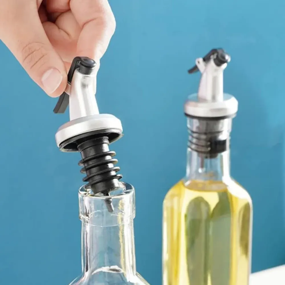 Distributeur d'huile d'olive en ambiance cuisine raffinée