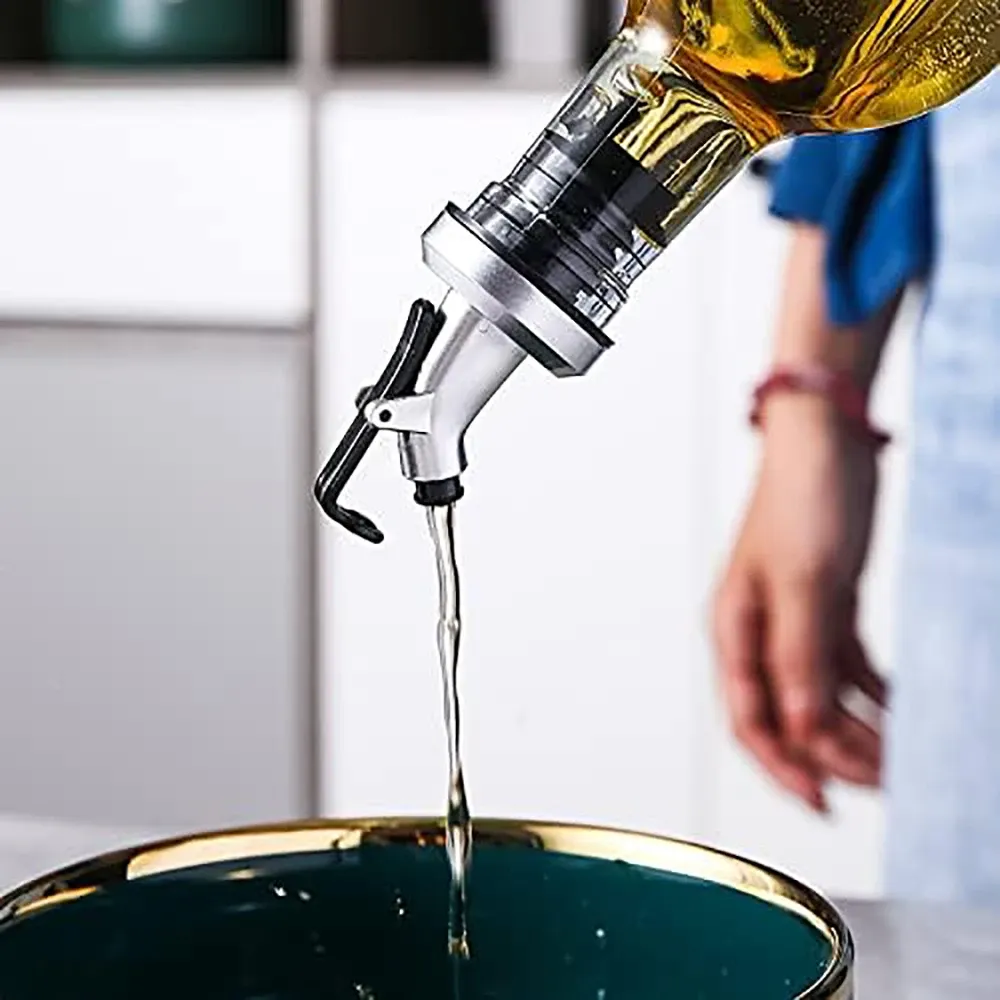 Distributeur d'huile d'olive sur un comptoir de bar